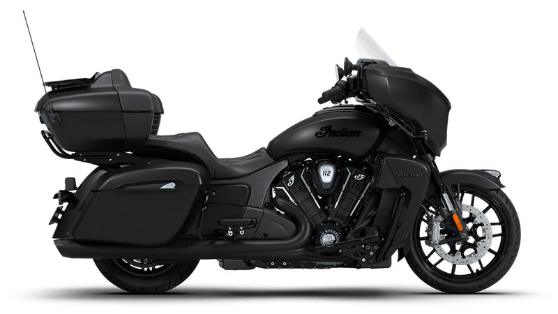 Load image into Gallery viewer, A black 2026 Indian Roadmaster Dark Horse touring motorcycle with saddlebags, a windshield, and a top case, shown in a side profile on a white background.

