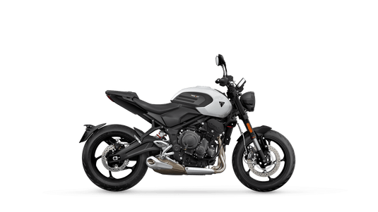 A side profile view of a 2026 Triumph Trident 660 LAMS - Snowdonia White motorcycle on a solid white background. The motorcycle features a silver and black color scheme with chrome accents.